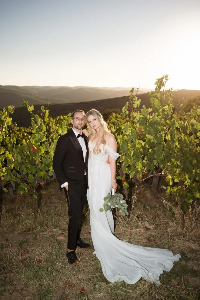 Editorial wedding photography at Borgo Castelvecchi during golden hour, featuring a beautiful couple in a refined, editorial pose.